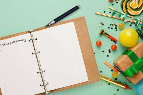 a notepad with party supplies